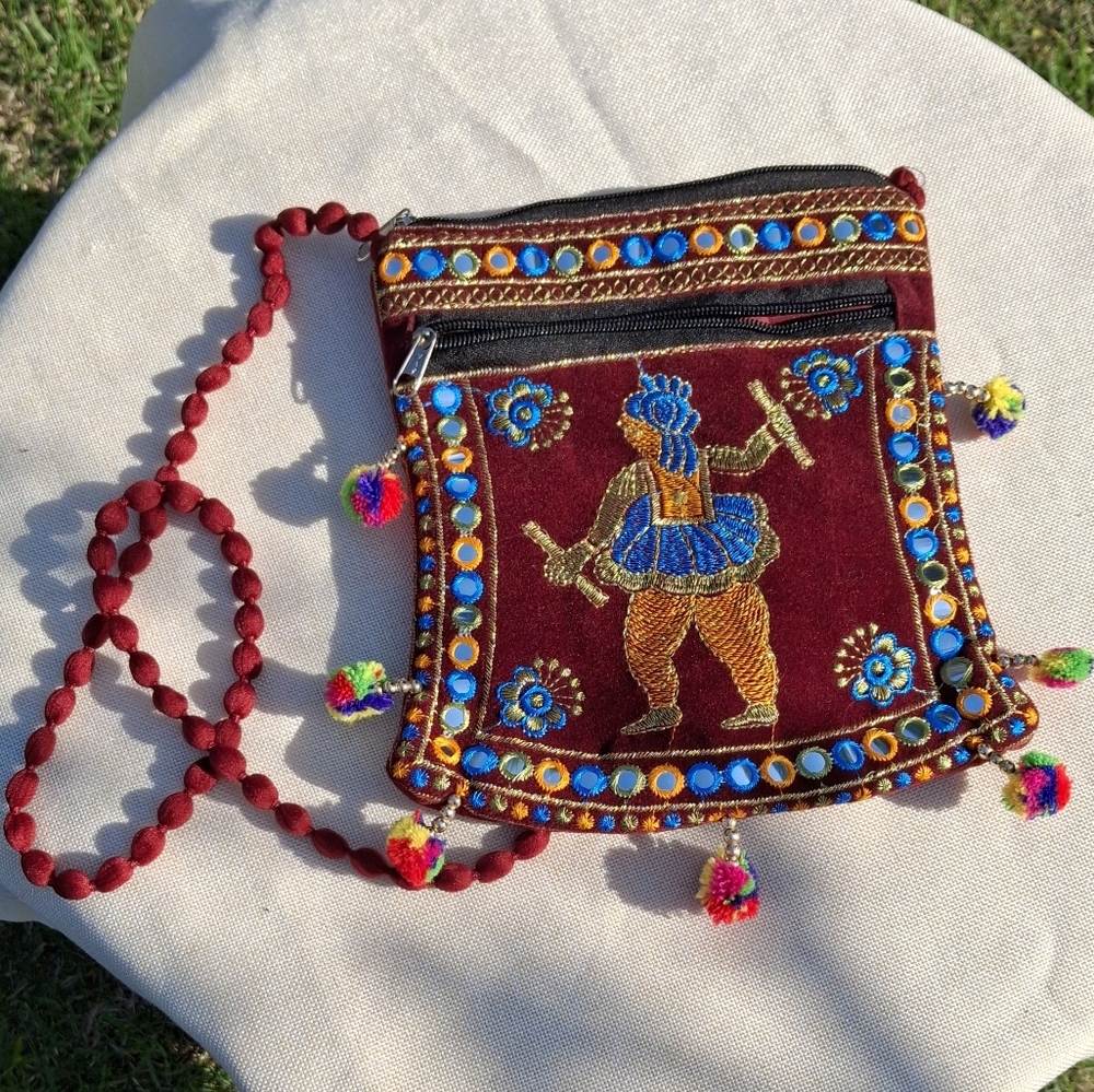 Red Crossbody Bag With Indian Style Embroidery And Tassels